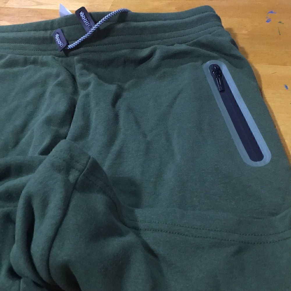 Wicked Stitch size Large wicked stitch flex fabric zippered pockets oliv…